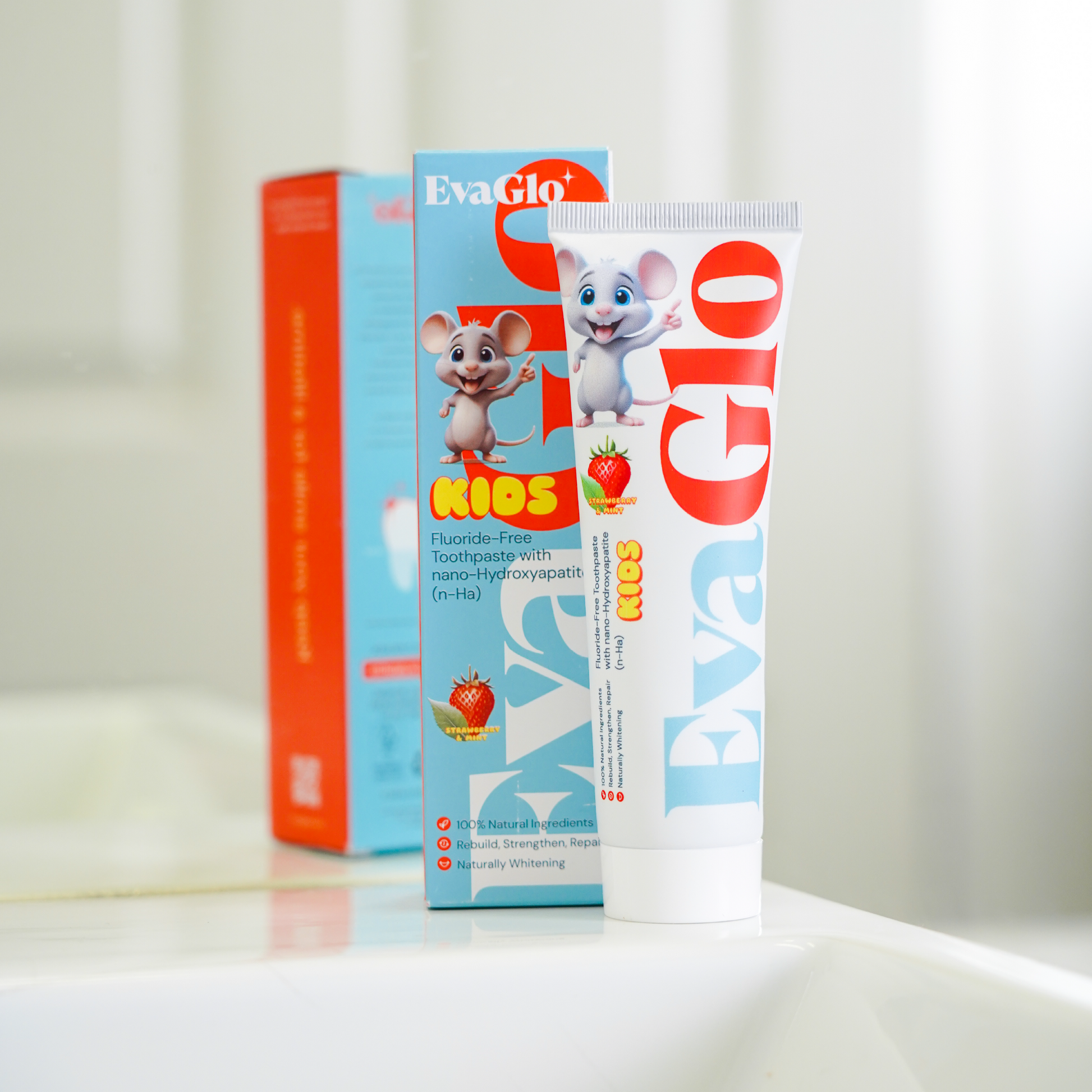 Eva Glo Kids toothpaste packaging with cartoon characters on a white background